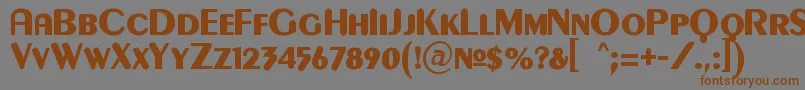 フォントGilgongoKaps – 茶色の文字が灰色の背景にあります。