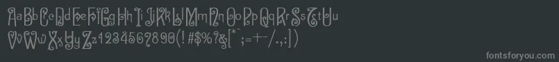 Шрифт Sevilladecor – серые шрифты на чёрном фоне