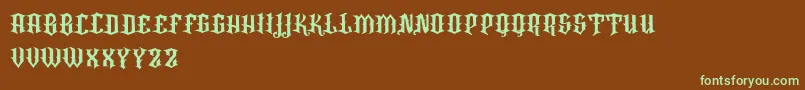 フォントVtksRafia – 緑色の文字が茶色の背景にあります。