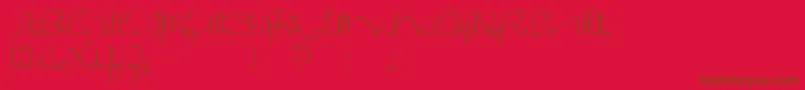 Saiba mais sobre a fonte BrokenKiss Fonte BrokenKiss – fontes marrons em um fundo vermelho