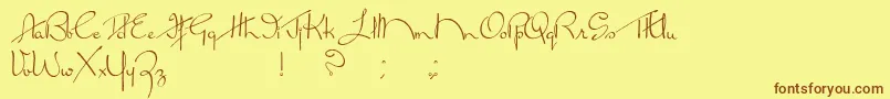 フォントBrokenKiss – 茶色の文字が黄色の背景にあります。