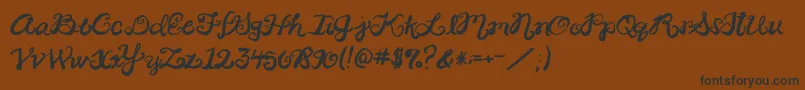 2peasRinglet Font – Black Fonts on Brown Background