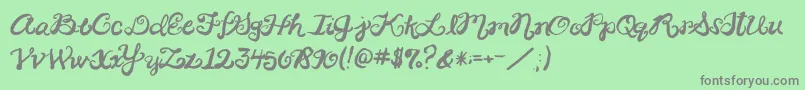 2peasRinglet-fontti – harmaat kirjasimet vihreällä taustalla