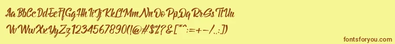 Fonte BillyTheGangItalic – fontes marrons em um fundo amarelo