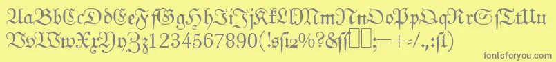 フォントJ790BlackletterRegular – 黄色の背景に灰色の文字