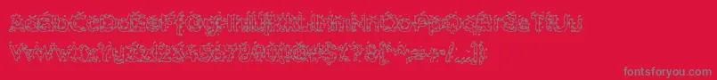 フォントHammh ffy – 赤い背景に灰色の文字