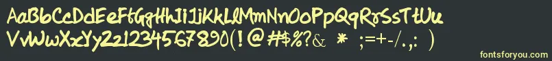 KolyHandwriting Font – Yellow Fonts on Black Background