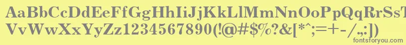 UkrainianjournalBold-fontti – harmaat kirjasimet keltaisella taustalla