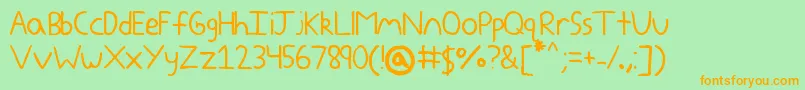 Yokomizo Font – Orange Fonts on Green Background