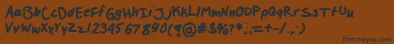 Izzylolfont Font – Black Fonts on Brown Background