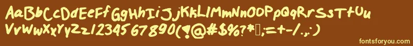 Fonte Izzylolfont – fontes amarelas em um fundo marrom