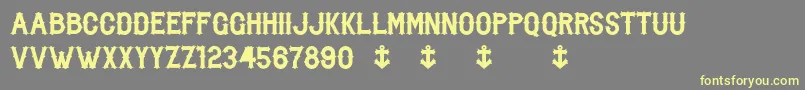 BikerFromHell-Schriftart – Gelbe Schriften auf grauem Hintergrund