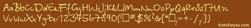 BetinaNormal-fontti – keltaiset fontit ruskealla taustalla