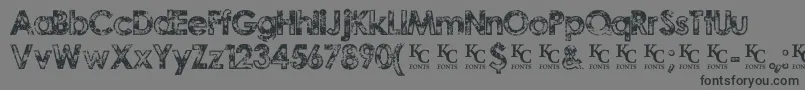 Шрифт TragicvisiondemoKcfonts – чёрные шрифты на сером фоне