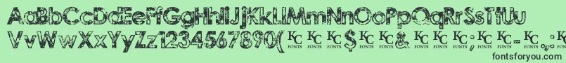 Czcionka TragicvisiondemoKcfonts – czarne czcionki na zielonym tle