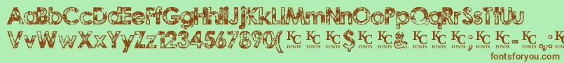 Шрифт TragicvisiondemoKcfonts – коричневые шрифты на зелёном фоне