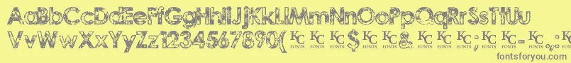 TragicvisiondemoKcfonts-fontti – harmaat kirjasimet keltaisella taustalla