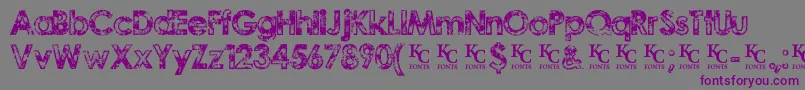 Czcionka TragicvisiondemoKcfonts – fioletowe czcionki na szarym tle