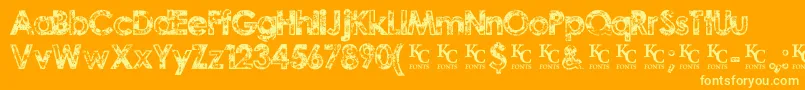 TragicvisiondemoKcfonts-fontti – keltaiset fontit oranssilla taustalla