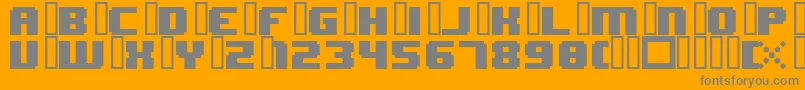8bitWonderNominal-fontti – harmaat kirjasimet oranssilla taustalla