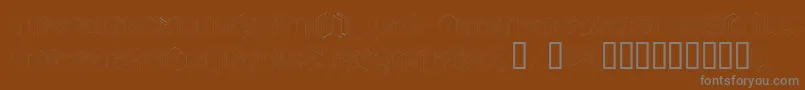 Czcionka Typonegative – szare czcionki na brązowym tle