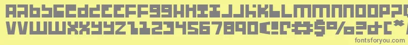フォントUfohuntere – 黄色の背景に灰色の文字