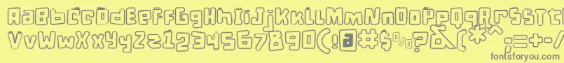 DPuntillasALace Font – Gray Fonts on Yellow Background