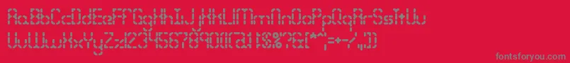 BleakSegmentsBrk-Schriftart – Graue Schriften auf rotem Hintergrund