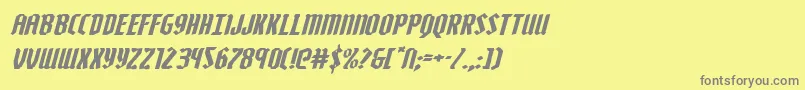 フォントZollernexpandital – 黄色の背景に灰色の文字