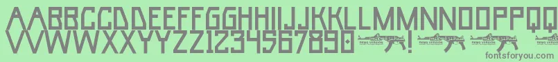 フォントUmarBase – 緑の背景に灰色の文字
