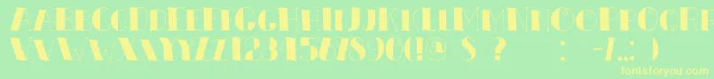 フォントDkZeebonk – 黄色の文字が緑の背景にあります
