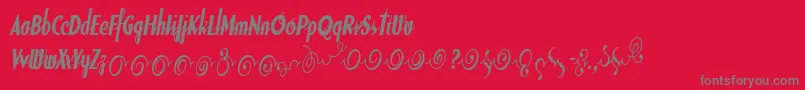 フォントSodaScriptBoldExtras – 赤い背景に灰色の文字
