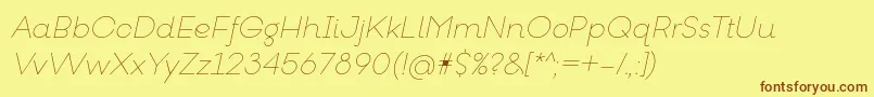 フォントGoeslimItalic – 茶色の文字が黄色の背景にあります。