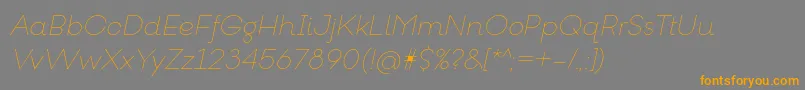 GoeslimItalic-Schriftart – Orangefarbene Schriften auf grauem Hintergrund
