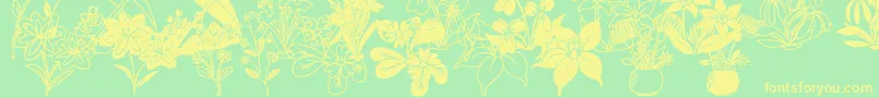 フォントDtFlowers2 – 黄色の文字が緑の背景にあります