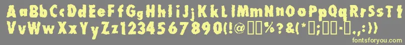 Millionair Font – Yellow Fonts on Gray Background