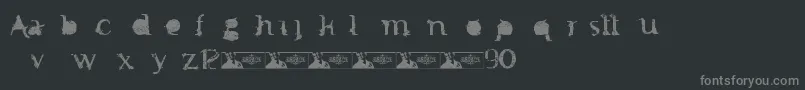 FtfMintheeIndonesiana3th-fontti – harmaat kirjasimet mustalla taustalla