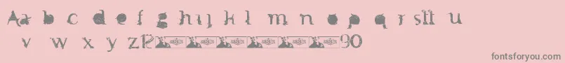 FtfMintheeIndonesiana3th-fontti – harmaat kirjasimet vaaleanpunaisella taustalla