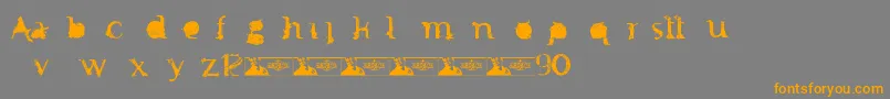 フォントFtfMintheeIndonesiana3th – オレンジの文字は灰色の背景にあります。