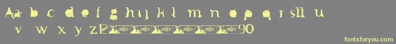 Шрифт FtfMintheeIndonesiana3th – жёлтые шрифты на сером фоне