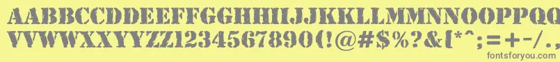 AStamperrgbt Font – Gray Fonts on Yellow Background