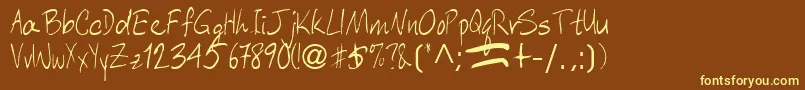AberaRegularTtnorm-fontti – keltaiset fontit ruskealla taustalla