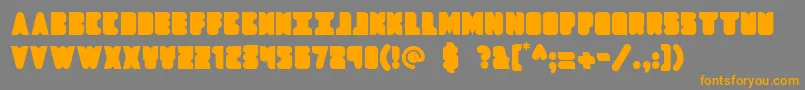 Czcionka Dropship – pomarańczowe czcionki na szarym tle