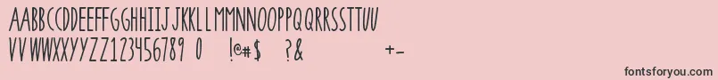 フォントSuperrawRegular – ピンクの背景に黒い文字