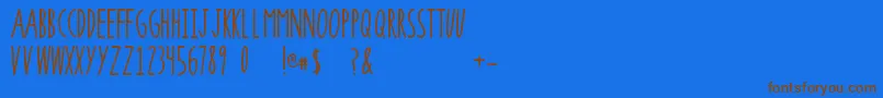 フォントSuperrawRegular – 茶色の文字が青い背景にあります。