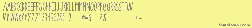 フォントSuperrawRegular – 黄色の背景に灰色の文字
