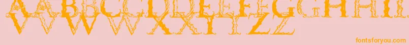 Vespasiancaps-fontti – oranssit fontit vaaleanpunaisella taustalla