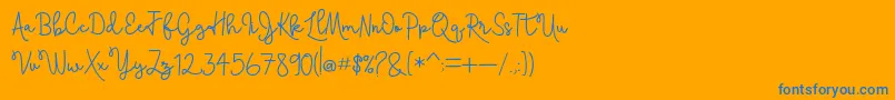 Skolateka-Schriftart – Blaue Schriften auf orangefarbenem Hintergrund