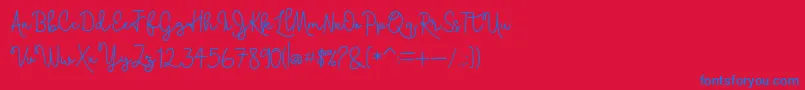 Skolateka-Schriftart – Blaue Schriften auf rotem Hintergrund