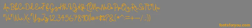More about Skolateka Font Skolateka Font – Orange Fonts on Gray Background